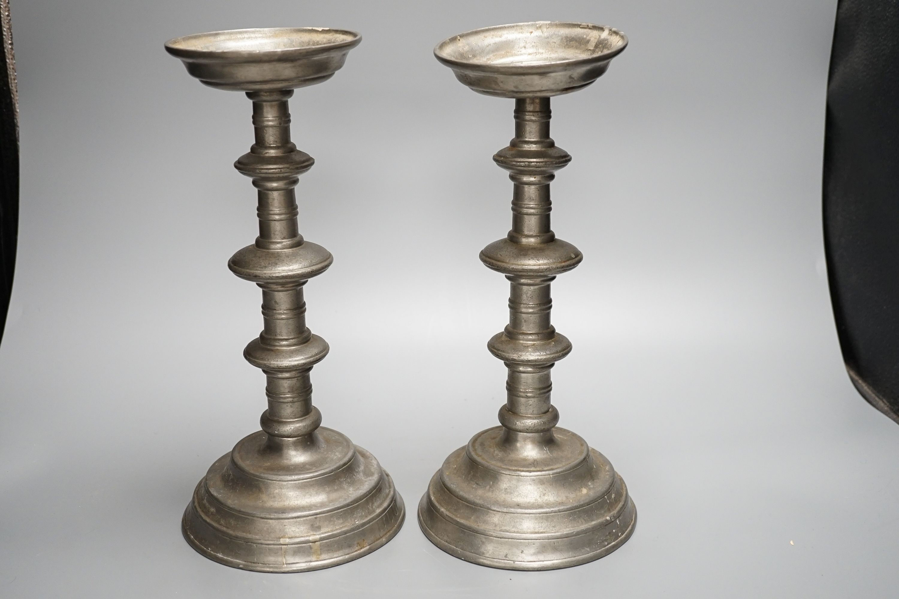 Pair of pewter candle-stands 32cm